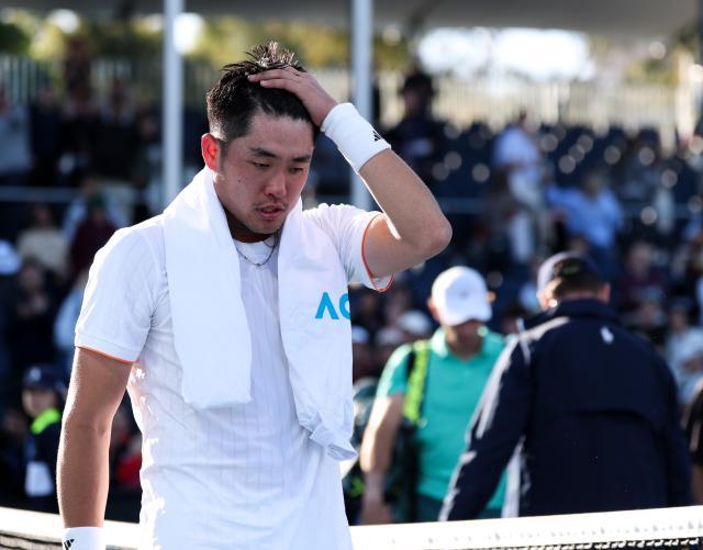 V体育网页版-四人出战无人进入32强 中国男网澳网喜忧参半